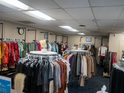Racks of clothing in tidy store