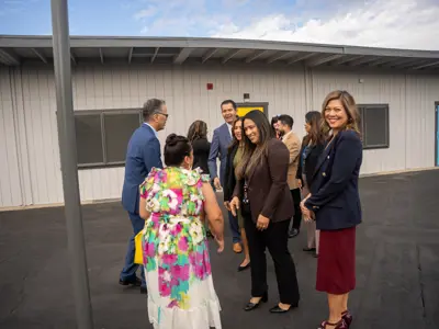 dignitaries being welcomed on school campus