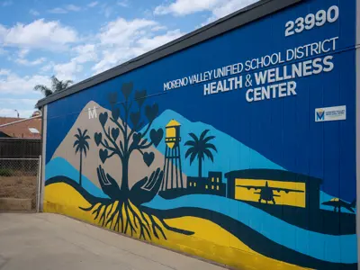 Moreno Valley Unified School District Health and Wellness Center sign and mural