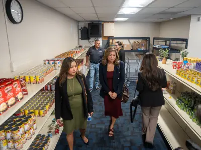 Guests touring grocery aisle at wellness center